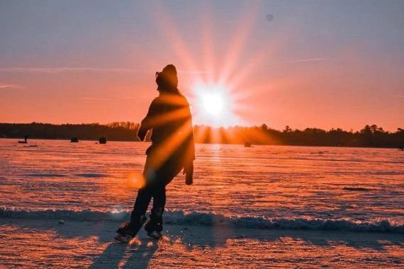 Student skating on Lake Bemidji